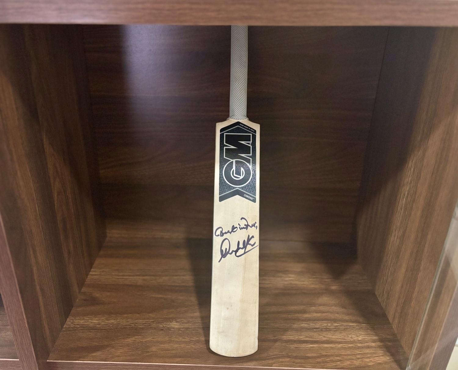 Autographed bat from Sachin